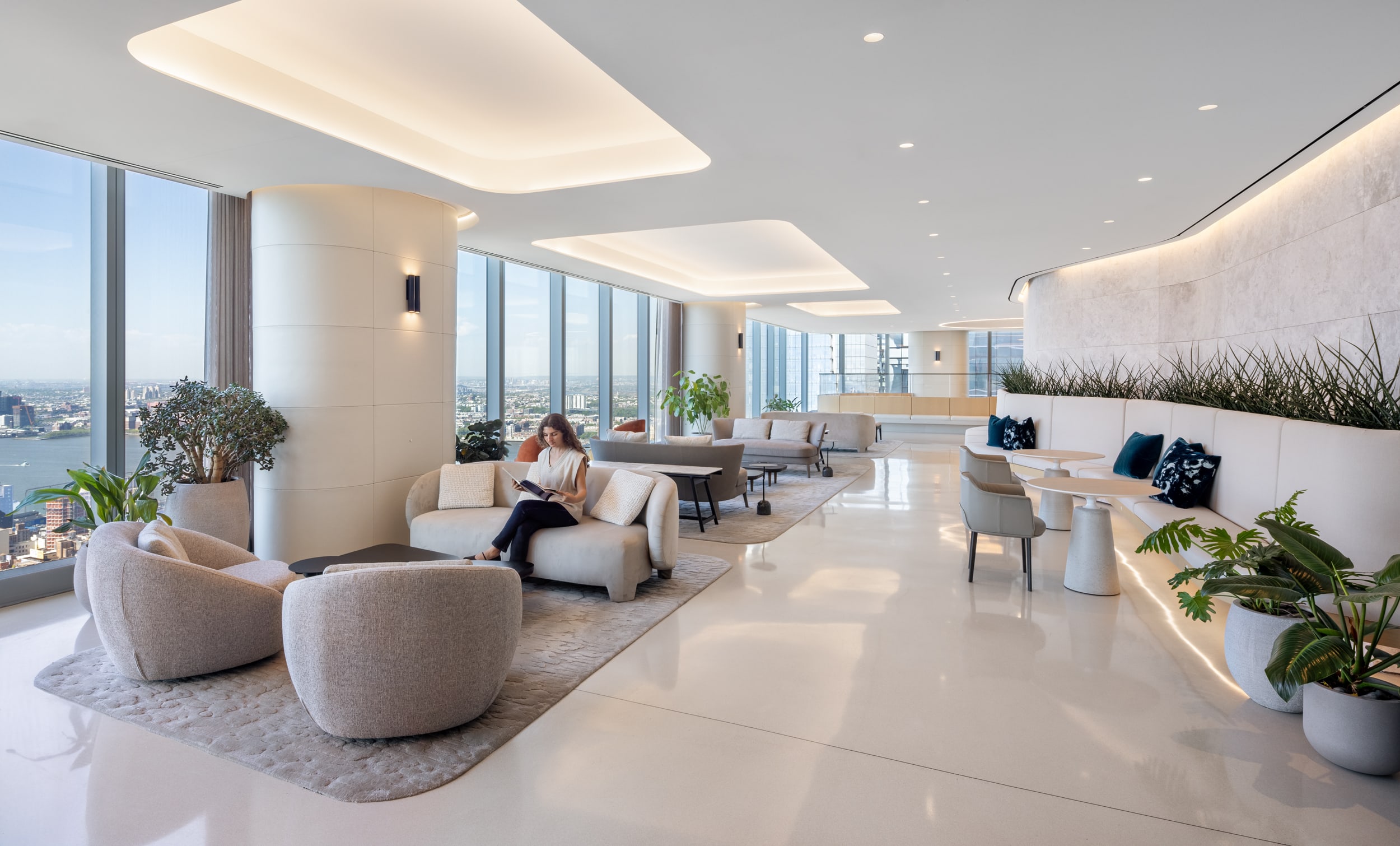 Lounge seating and planted banquettes overlooking the city at a global law firm, by Greenery NYC