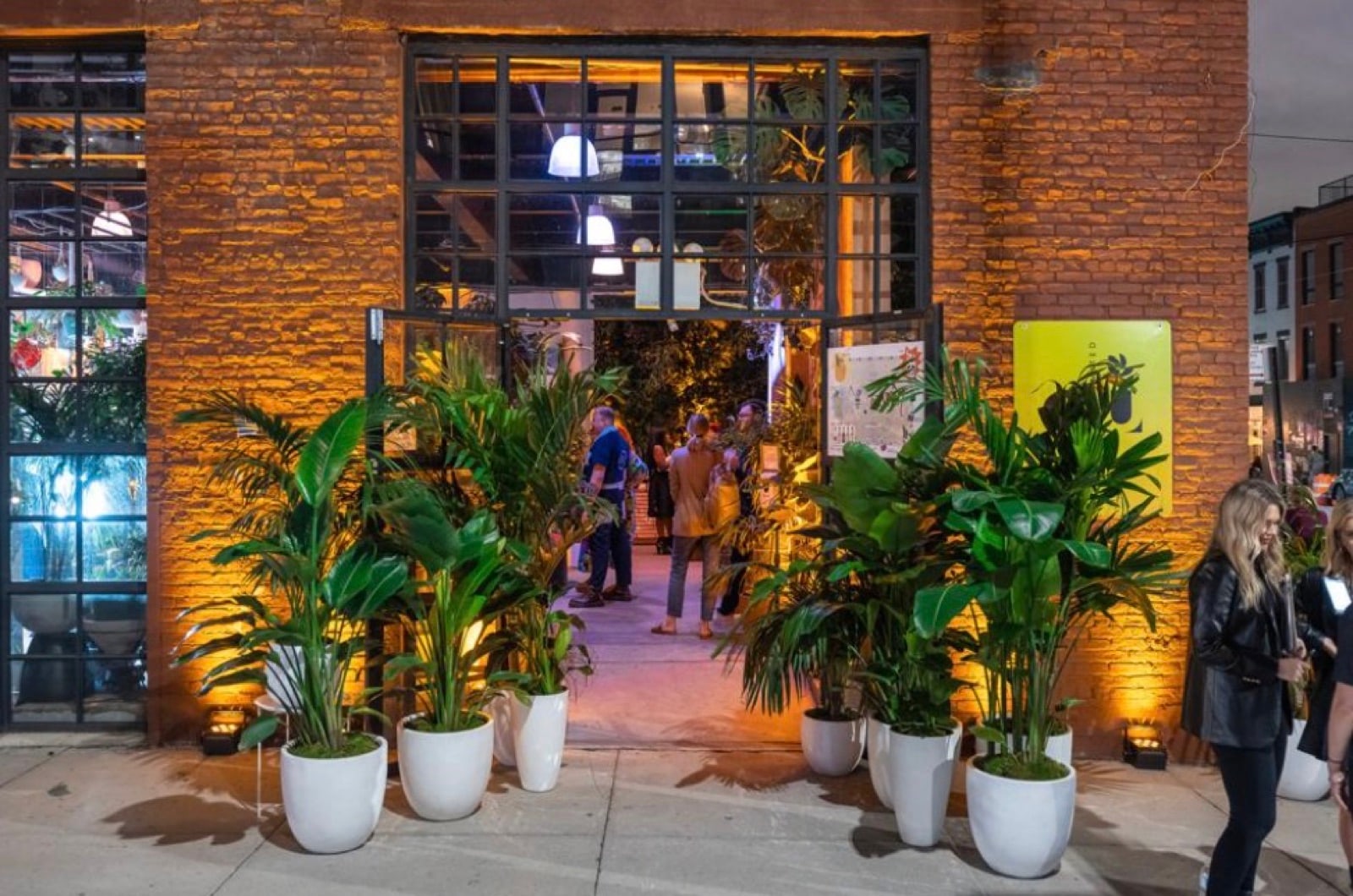 A brand activation entrance styled with live plants by Greenery NYC