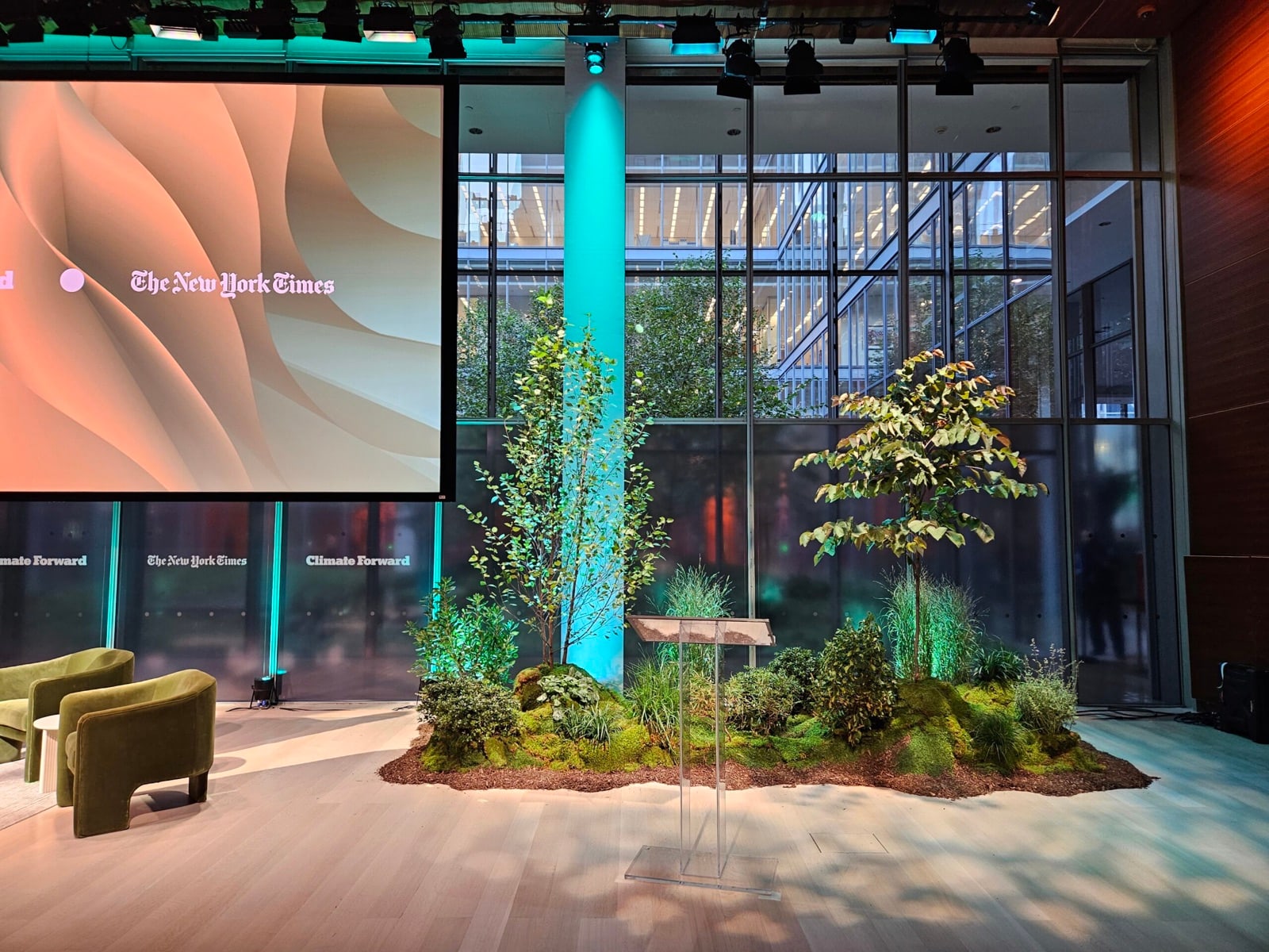 A live moss and plant landscape built for a conference stage by Greenery NYC